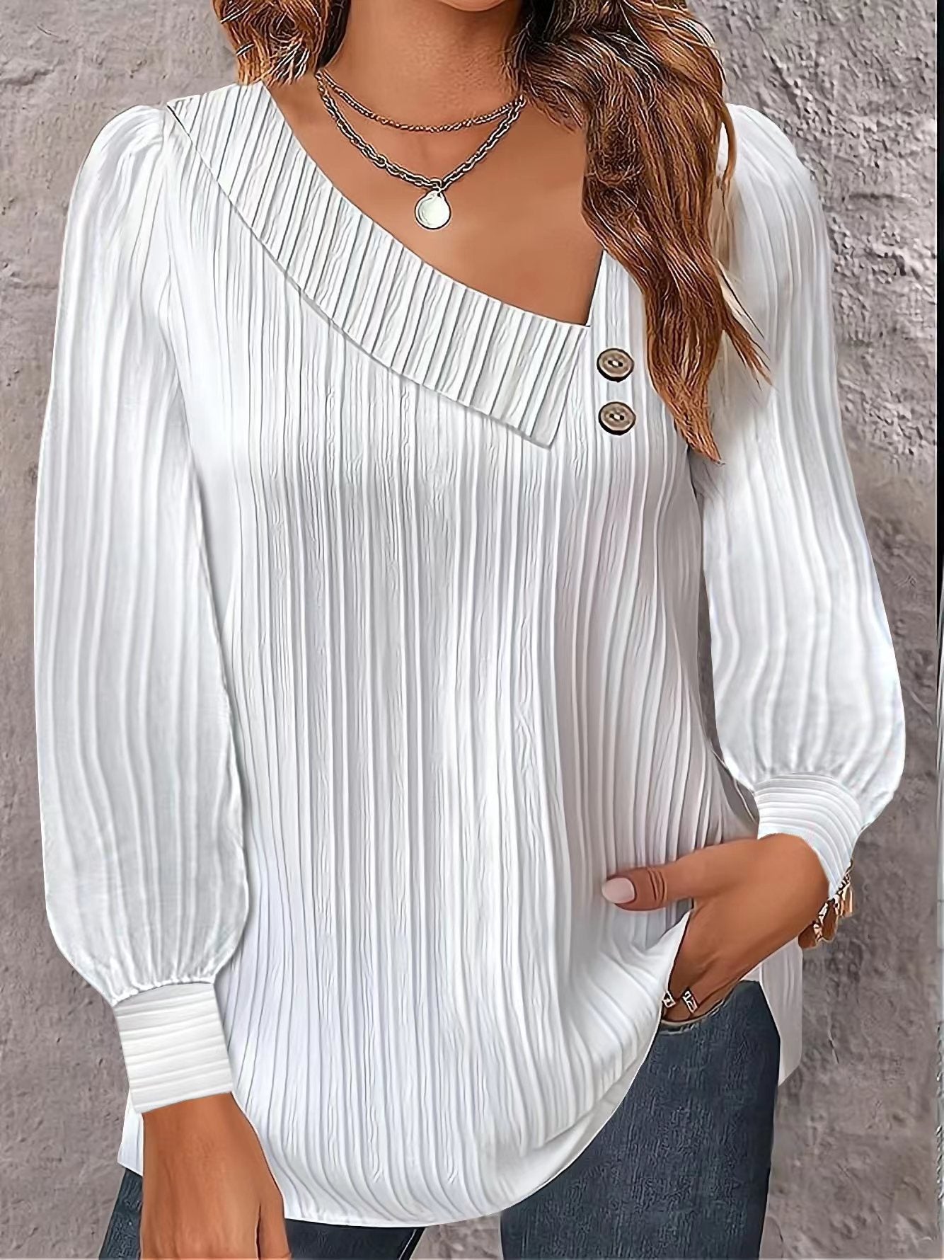 Women's stylish and elegant top with asymmetrical neckline and button placket NOVAE