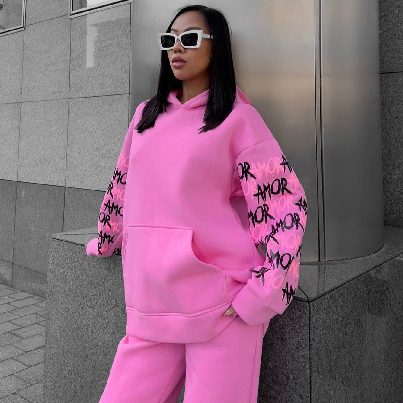 Women's hoodie with creative lettering and unique sleeve graphics NOVAE