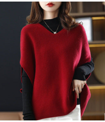 Women's knitted poncho with V-neck and elegant silhouette NOVAE