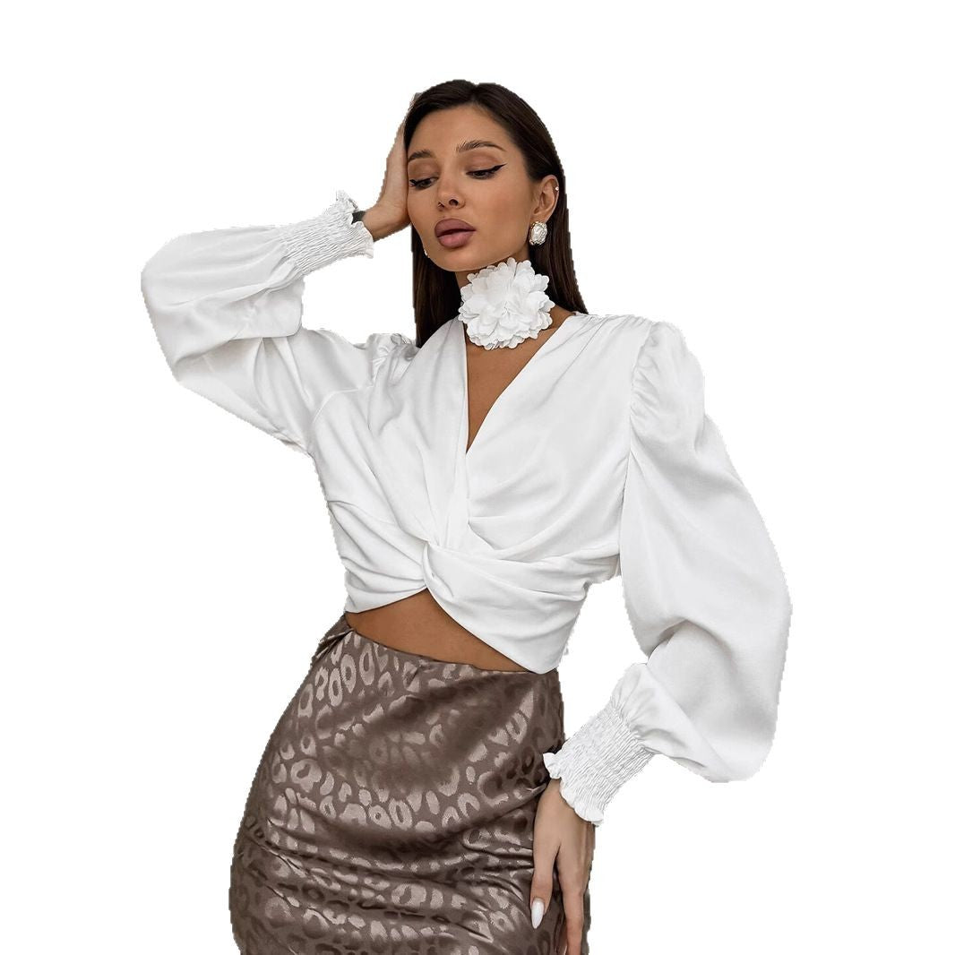 Women's elegantly cut blouse shirt with voluminous sleeves and button detail NOVAE
