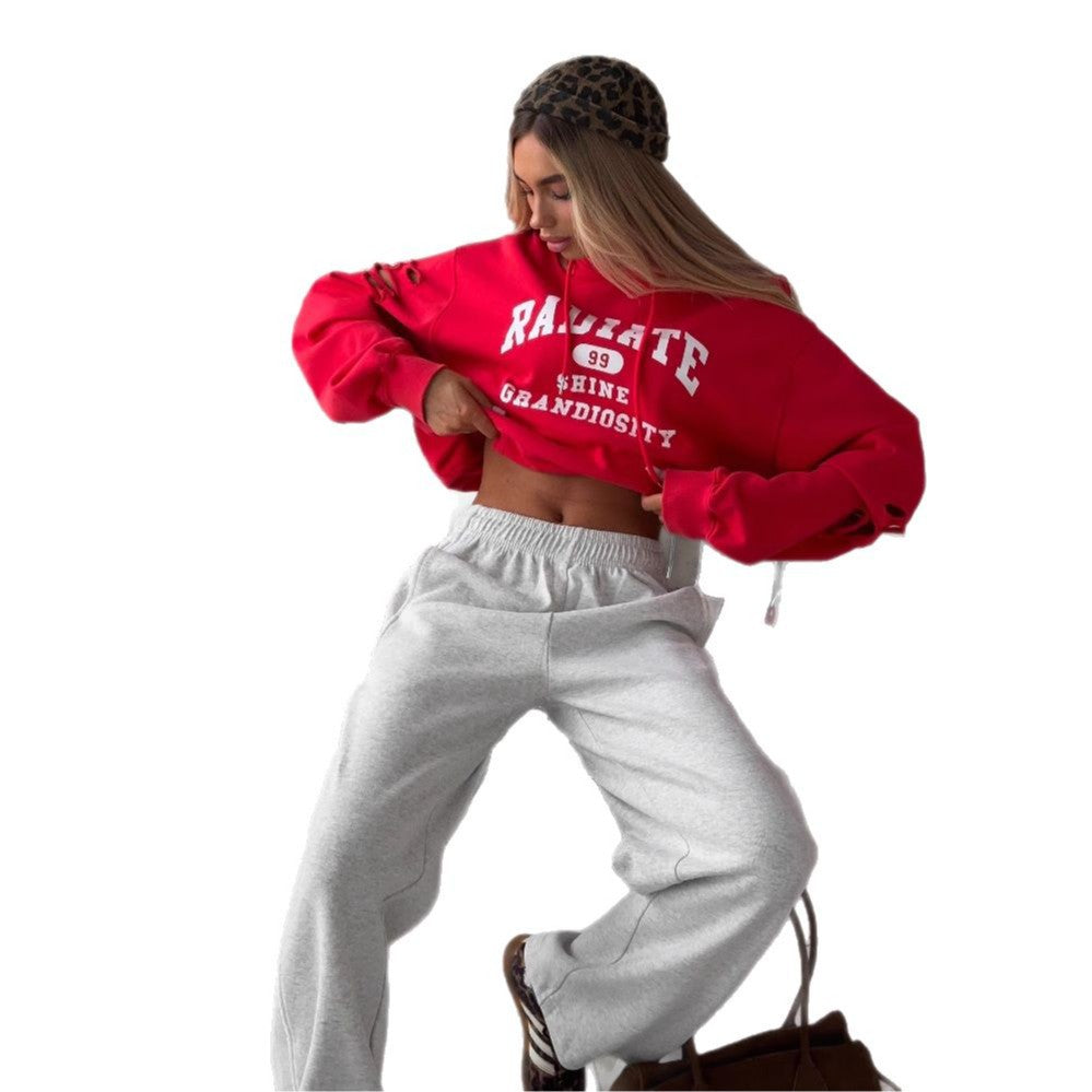 Women's cropped hoodie with creative cut details and large NOVAE lettering