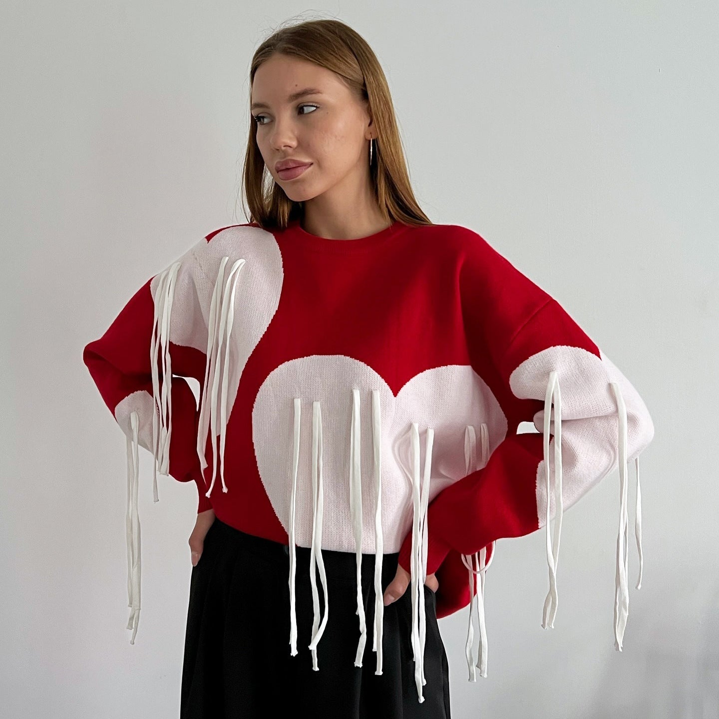 Women's fashionable sweater with a cheerful heart design and creative fringe NOVAE
