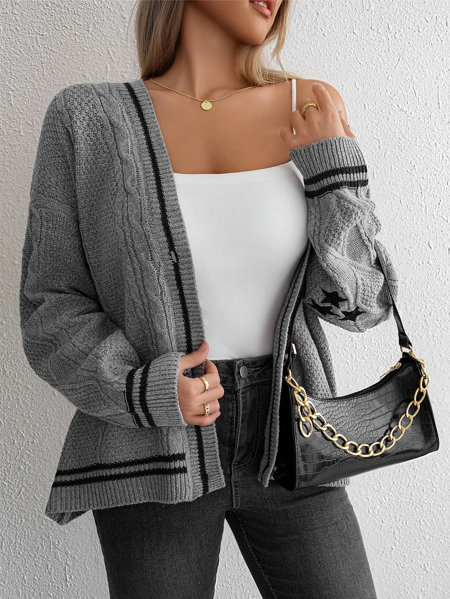 Women's chunky knit cardigan with elegant star appliqués and contrasting details NOVAE