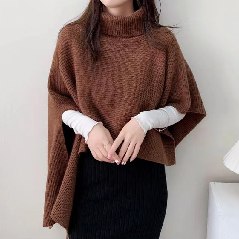 Women's knitted poncho with high collar and elegant ribbed texture NOVAE