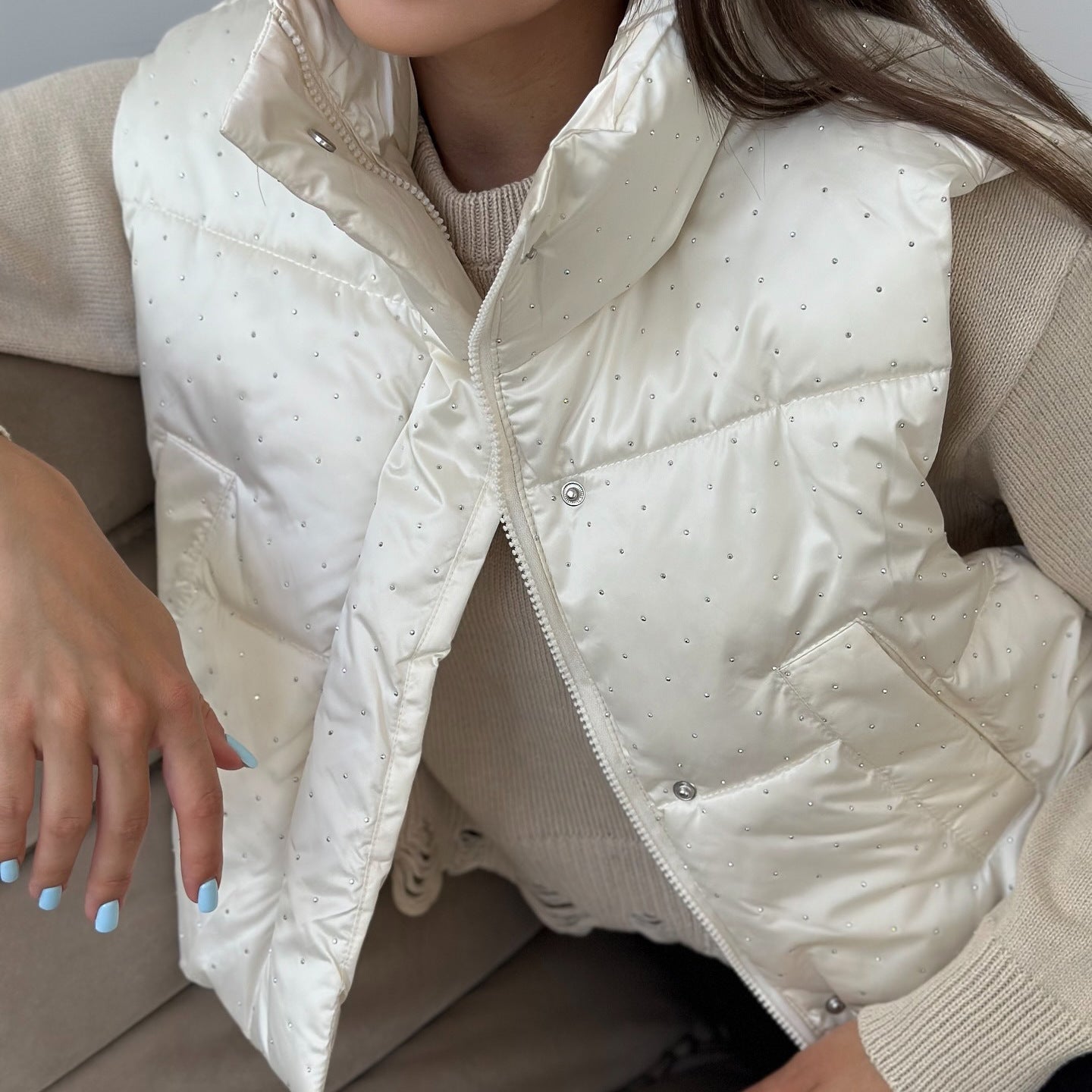 Women's quilted vest with fashionable accents and high collar NOVAE