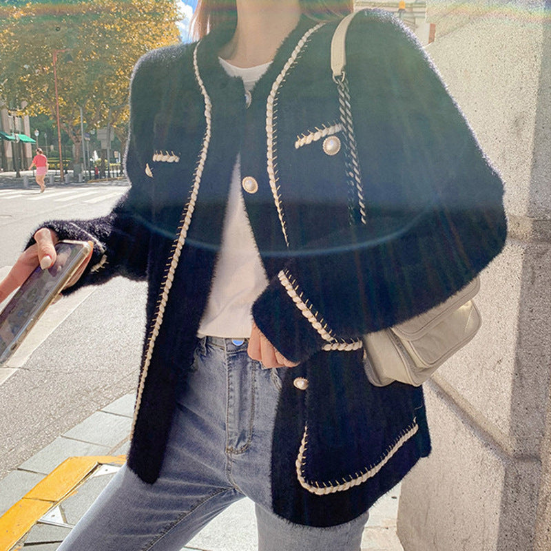 Women's fashionable cardigan with elegant contrast stitching and button details NOVAE