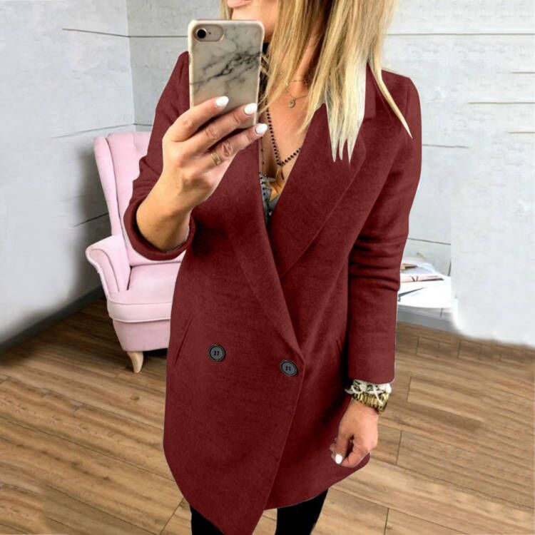 Women's extra-long, tailored coat with elegant lapels and practical pockets NOVAE