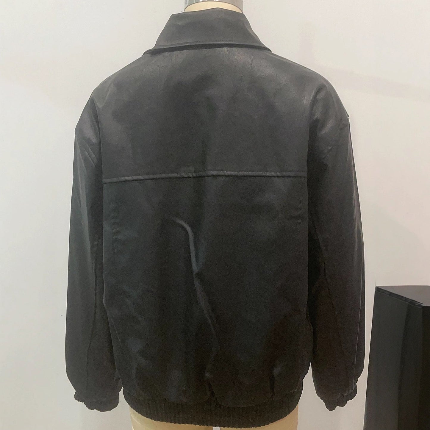 Women's casual leather jacket with elasticated hem and practical pockets NOVAE