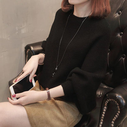 Women's cozy knit sweater with a relaxed fit and wide sleeves NOVAE