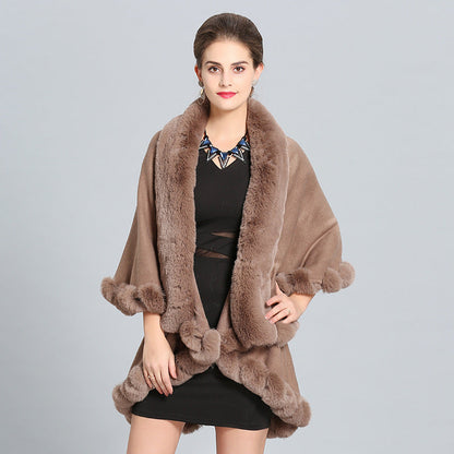 Women's hooded poncho with luxurious fur collar and elegant trim NOVAE
