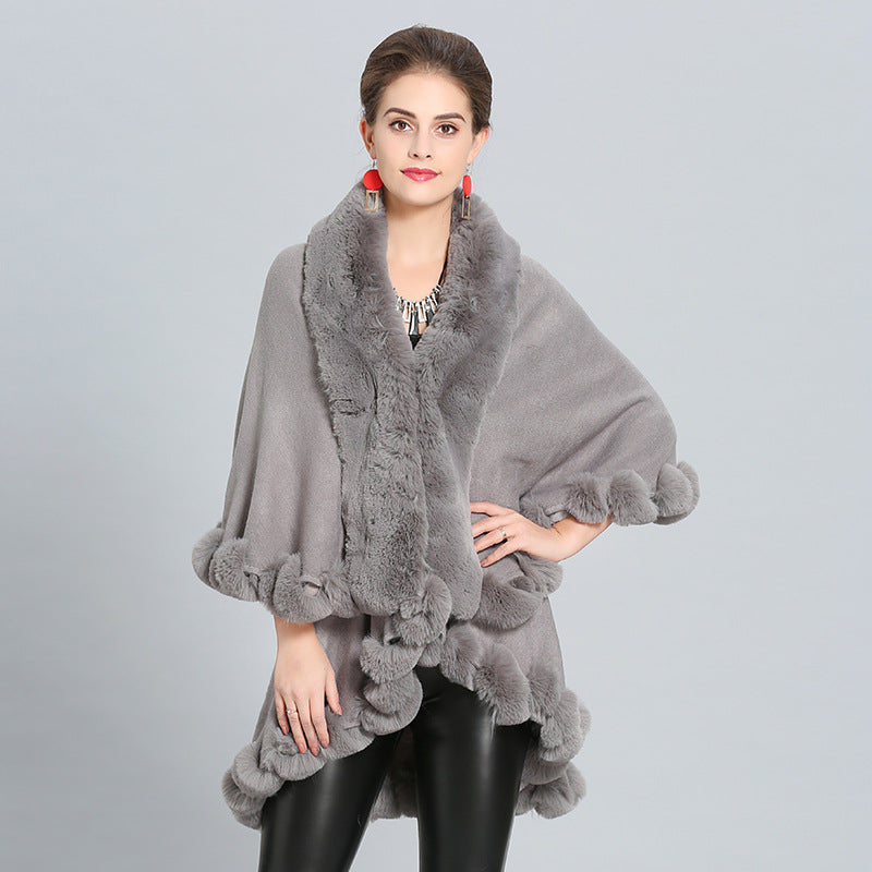Women's hooded poncho with luxurious fur collar and elegant trim NOVAE