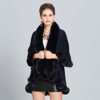 Women's hooded poncho with luxurious fur collar and elegant trim NOVAE