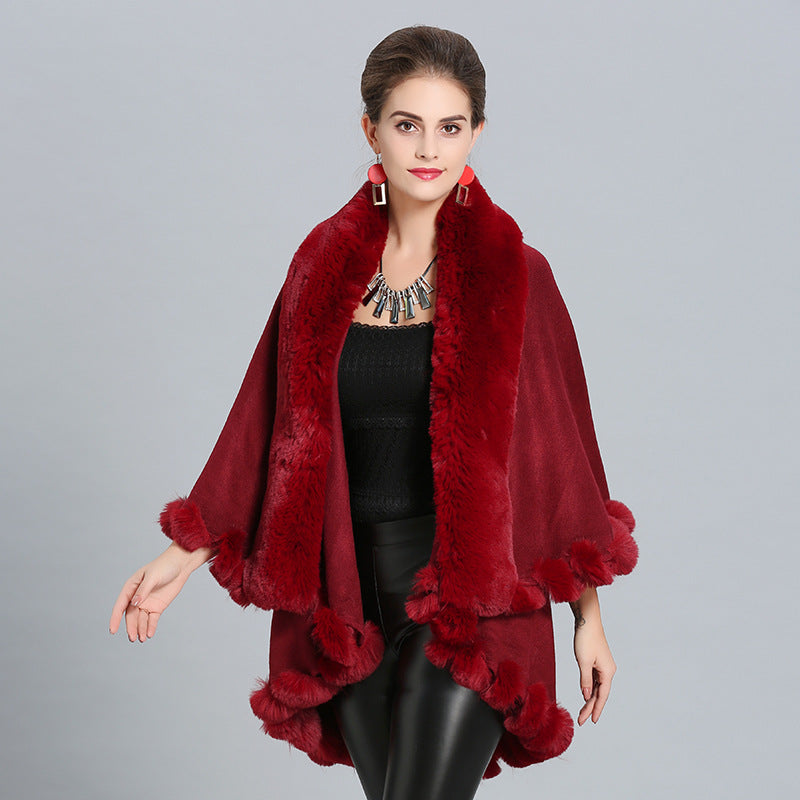 Women's hooded poncho with luxurious fur collar and elegant trim NOVAE