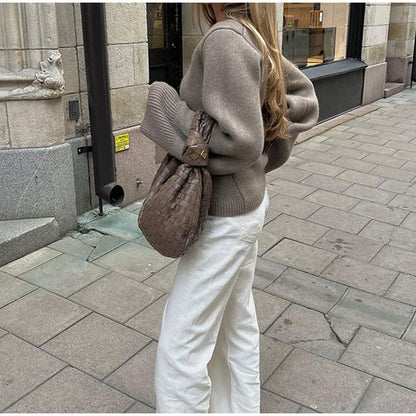 Women's casual knit cardigan with chic button placket and practical pockets NOVAE