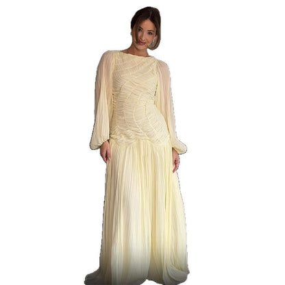 Women's maxi dress with sophisticated pleats and elegant long sleeves NOVAE