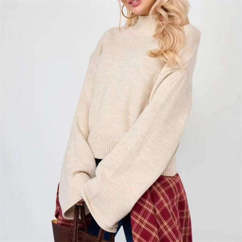 Women's knitted sweater with a relaxed fit and voluminous sleeves NOVAE