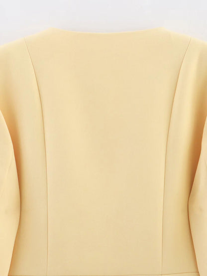 Women's elegant blazer with a fashionable cut and decorative button details NOVAE