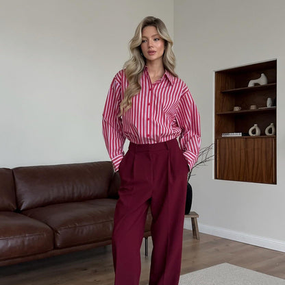 Women's striped blouse with voluminous sleeves and fashionable button details NOVAE