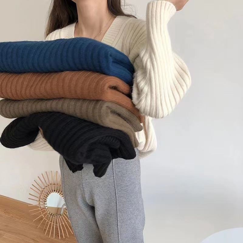 Women's viscose knit sweater with V-neck and ribbed design NOVAE