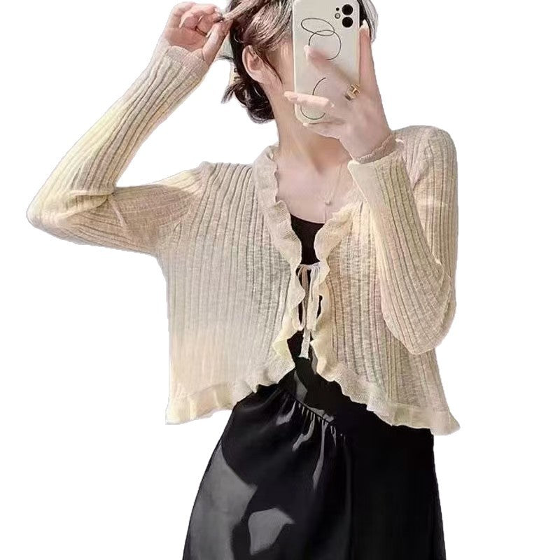 Women's cardigan with ruffle details and airy structure NOVAE