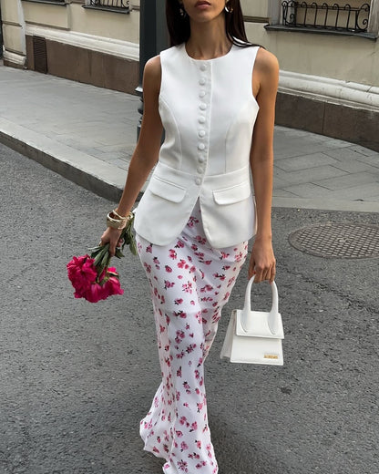 Women's elegant vest with feminine button details and fashionable side pockets NOVAE