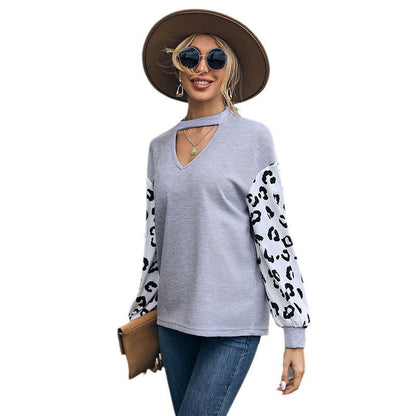 Women's sweatshirt with V-neck and trendy leopard sleeves NOVAE
