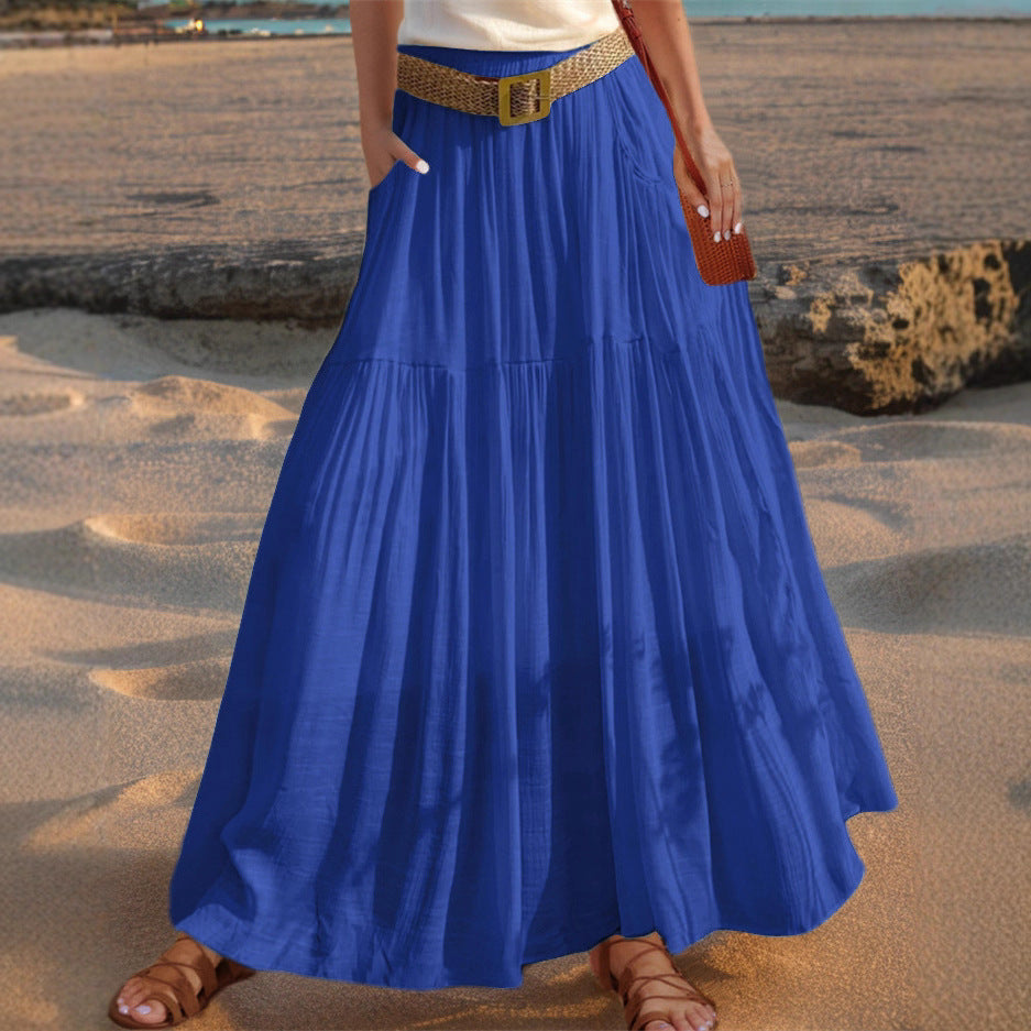 Women's wide-flared maxi skirt with elegant pleats and practical pockets NOVAE