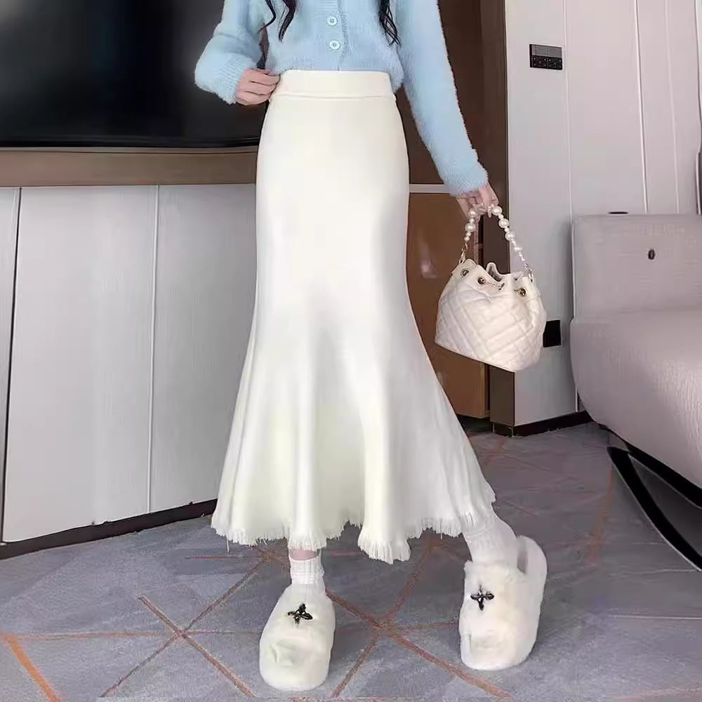 Women's elegant maxi skirt with voluminous hem and fringed details NOVAE