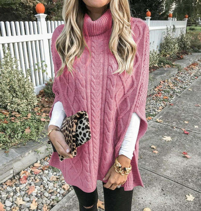 Women's knitted poncho with high collar and decorative cable pattern NOVAE