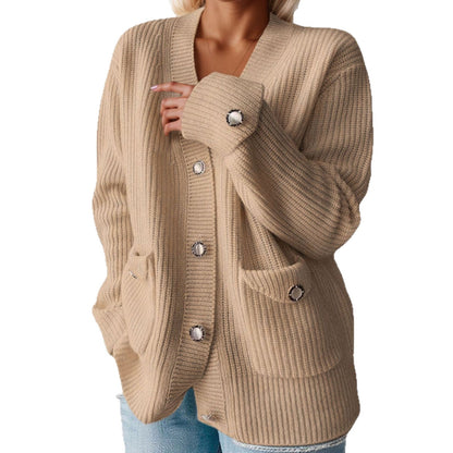 Women's chunky knit cardigan with practical pockets and elegant button details NOVAE