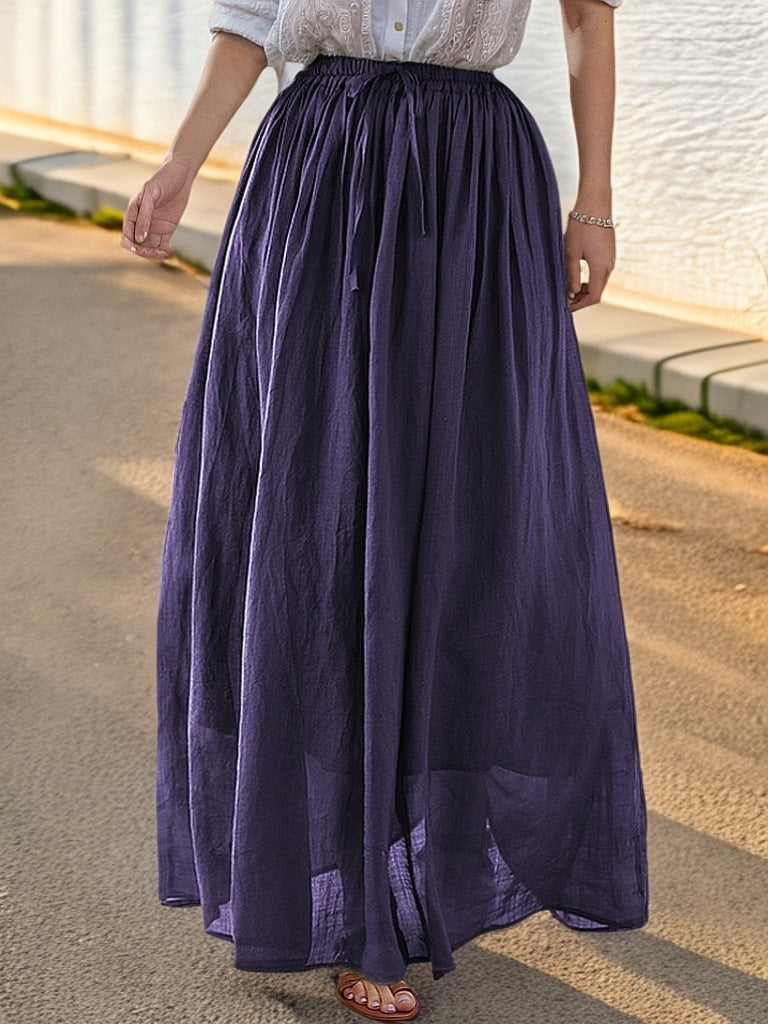 Women's elegant maxi skirt with a flowing cut and practical tie straps NOVAE