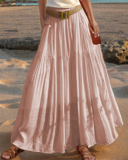 Women's wide-flared maxi skirt with elegant pleats and practical pockets NOVAE