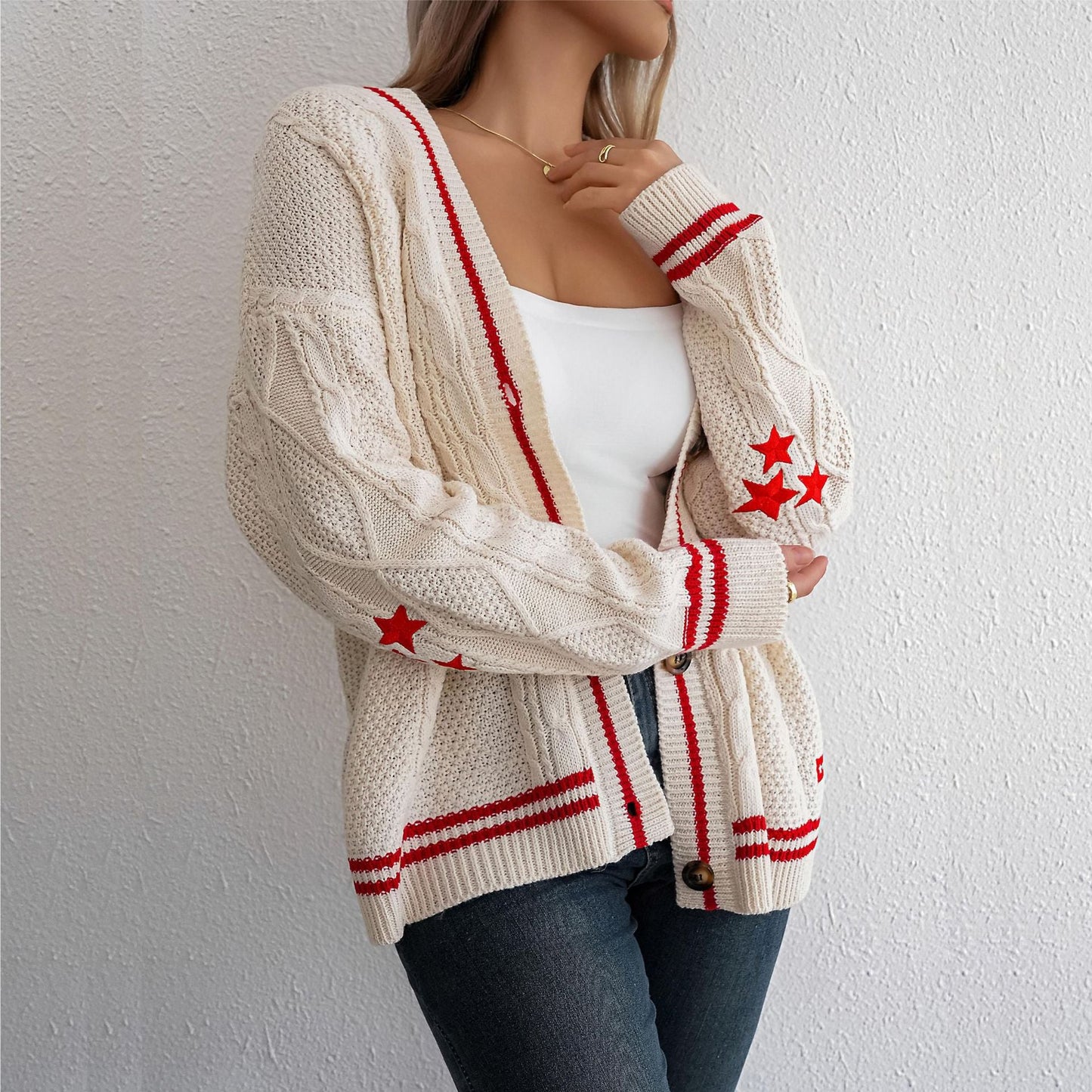 Women's chunky knit cardigan with elegant star appliqués and contrasting details NOVAE