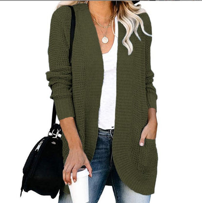 Women's knitted cardigan with practical pockets and airy structure NOVAE