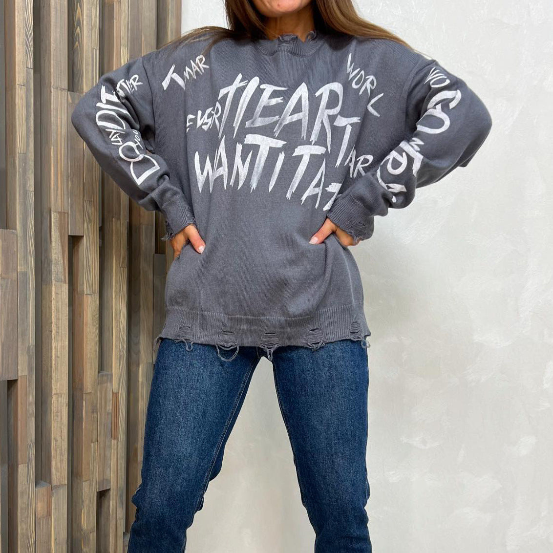 Women's oversized sweatshirt with creative lettering and fashionable ripped details NOVAE