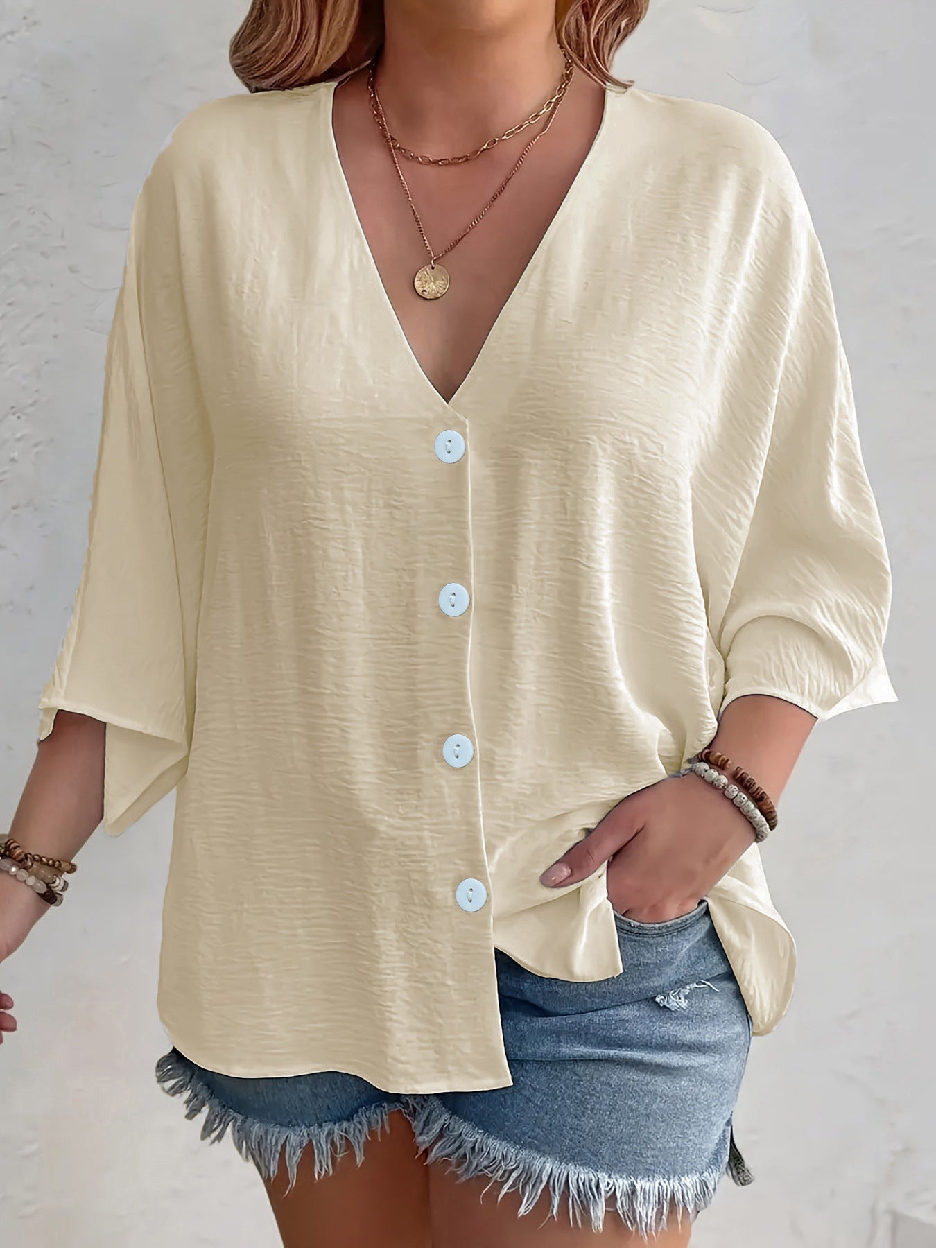 Women's flattering short-sleeved blouse with button placket and V-neck NOVAE