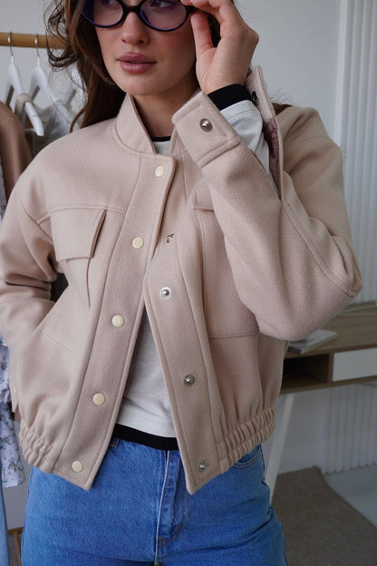 Women's fashionable short jacket with practical pockets and a cool collar NOVAE