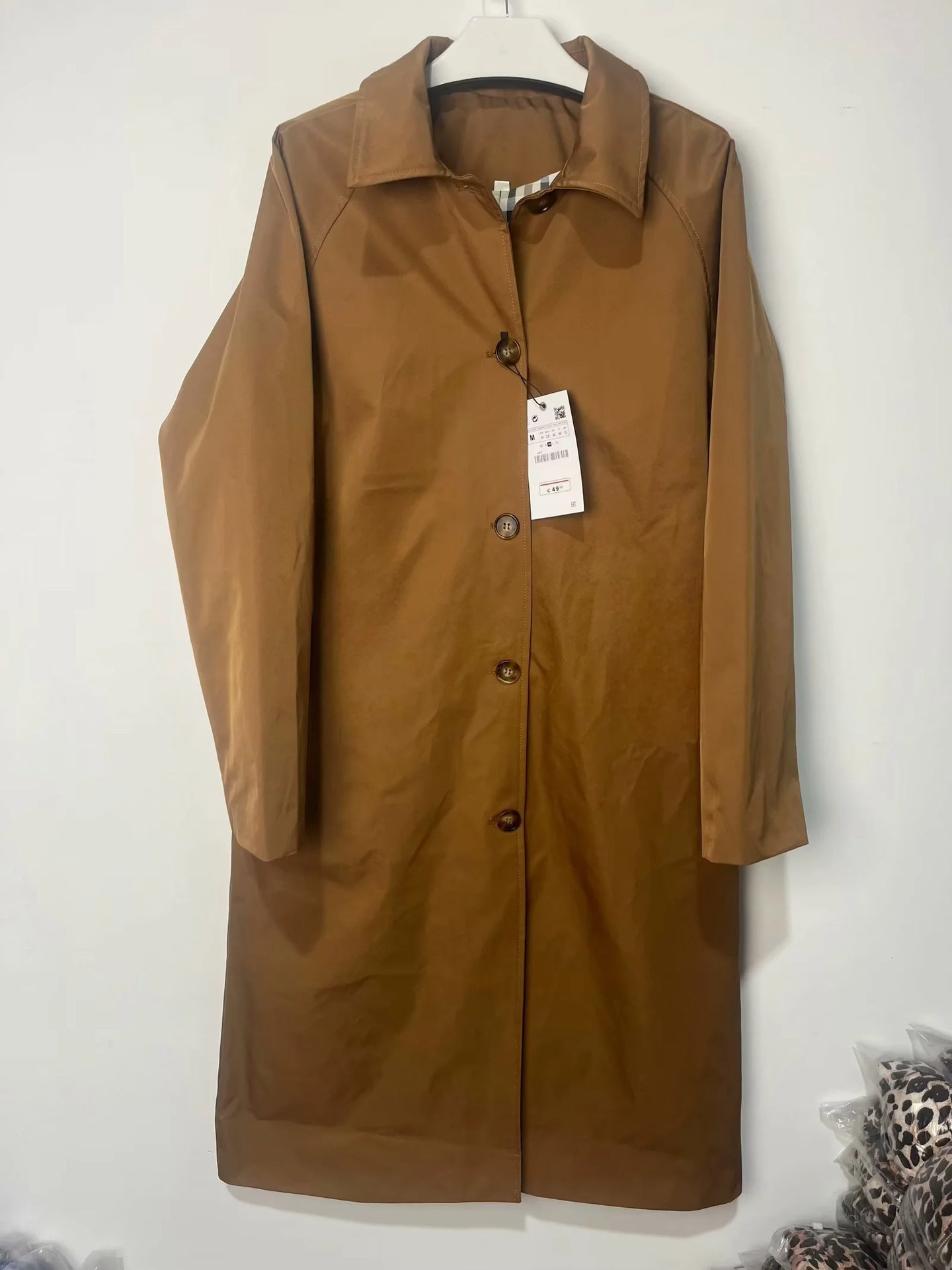 Women's fashionable transitional jacket with elegant stand-up collar and practical button details NOVAE