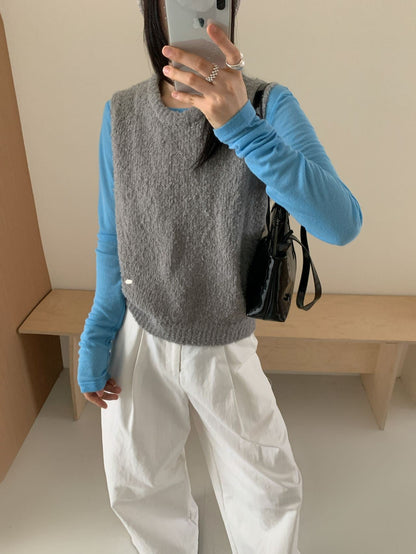 Women's knitted vest with soft, fluffy material and modern cut NOVAE