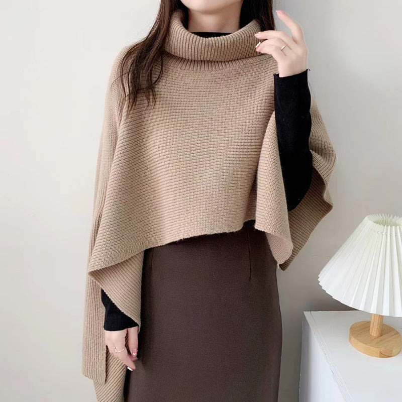 Women's knitted poncho with high collar and elegant ribbed texture NOVAE