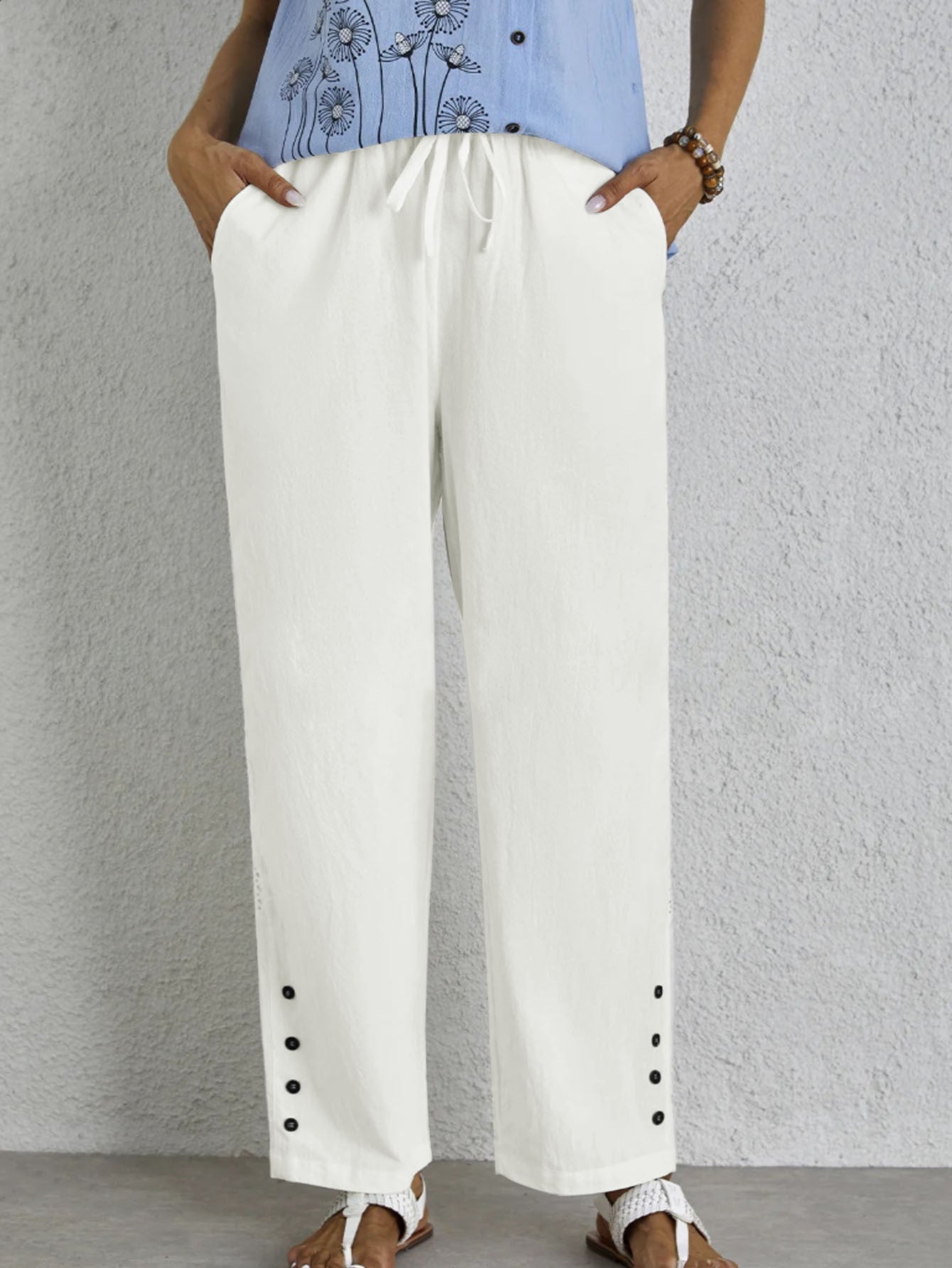 Women's high-waisted chino trousers with elasticated waistband and side pockets NOVAE