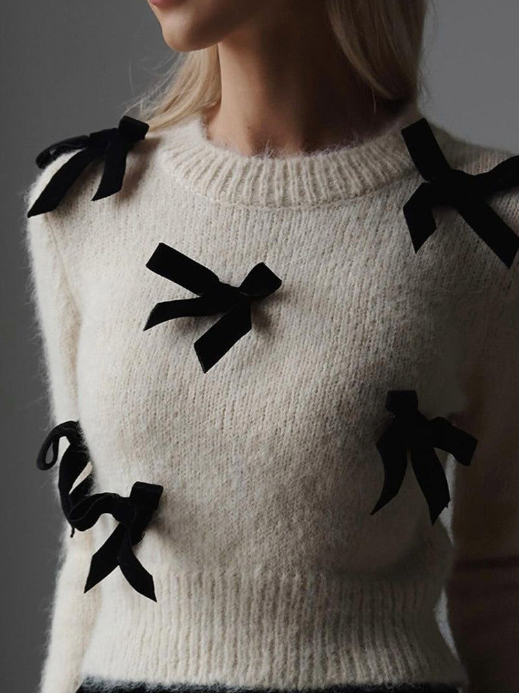 Women's knitted sweater with decorative bows NOVAE