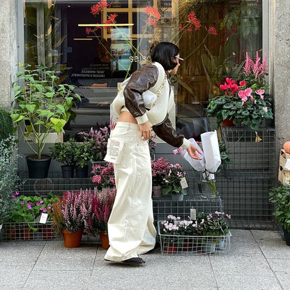 Women's oversized cardigan with leather sleeves and modern accents NOVAE