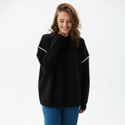 Women's elegant knit sweater with unique ribbed textures and fashionable accents NOVAE