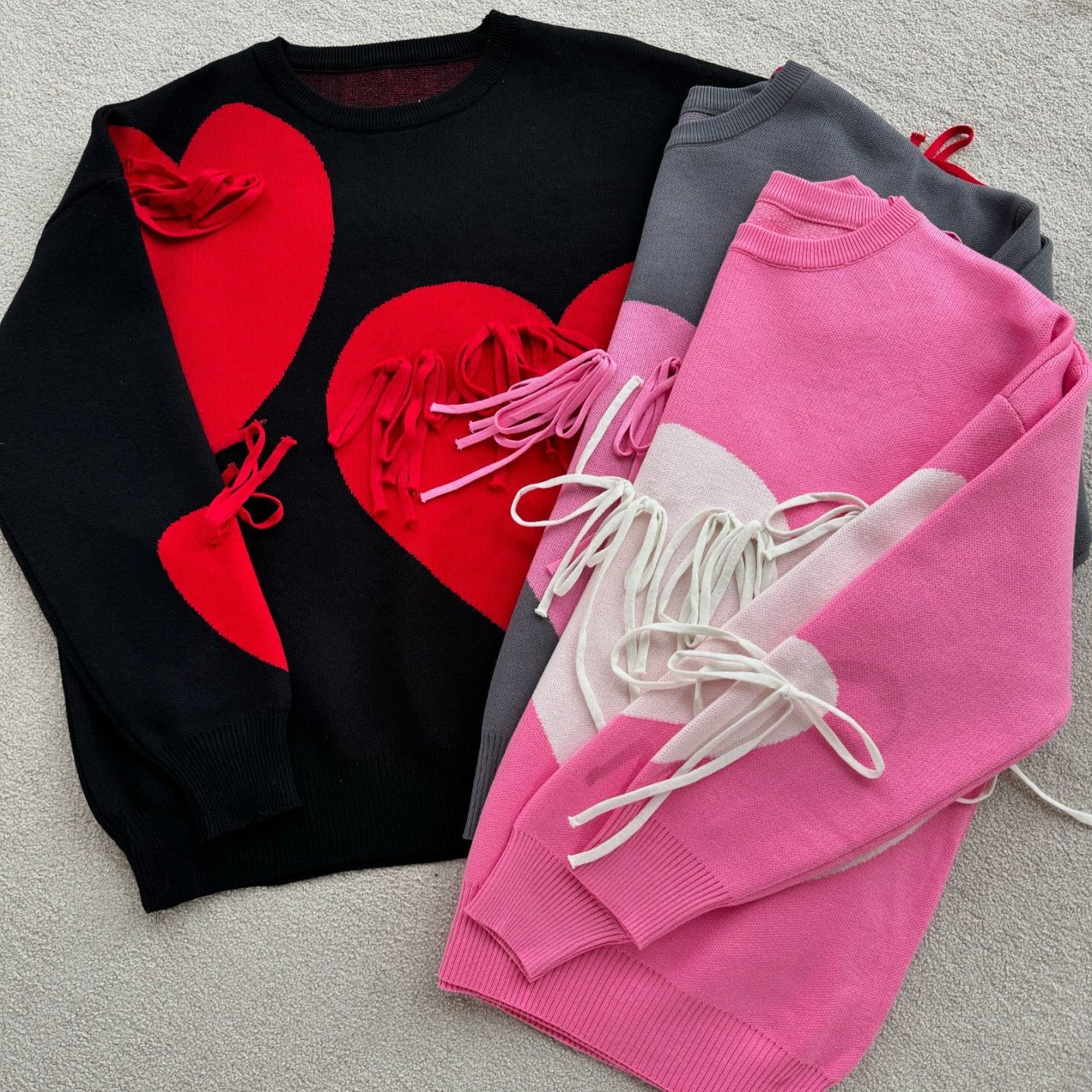 Women's fashionable sweater with a cheerful heart design and creative fringe NOVAE