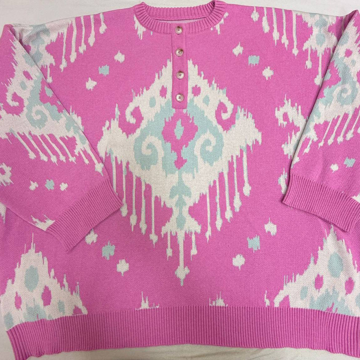 Women's knitted sweater with innovative pattern NOVAE