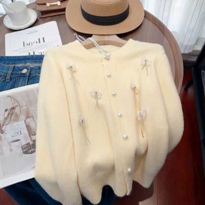 Women's cardigan with feminine appliqués and button details NOVAE