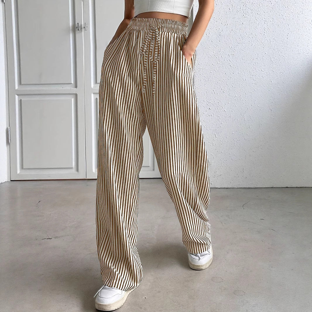 Women's wide-legged striped trousers with elasticated waistband and practical pockets NOVAE