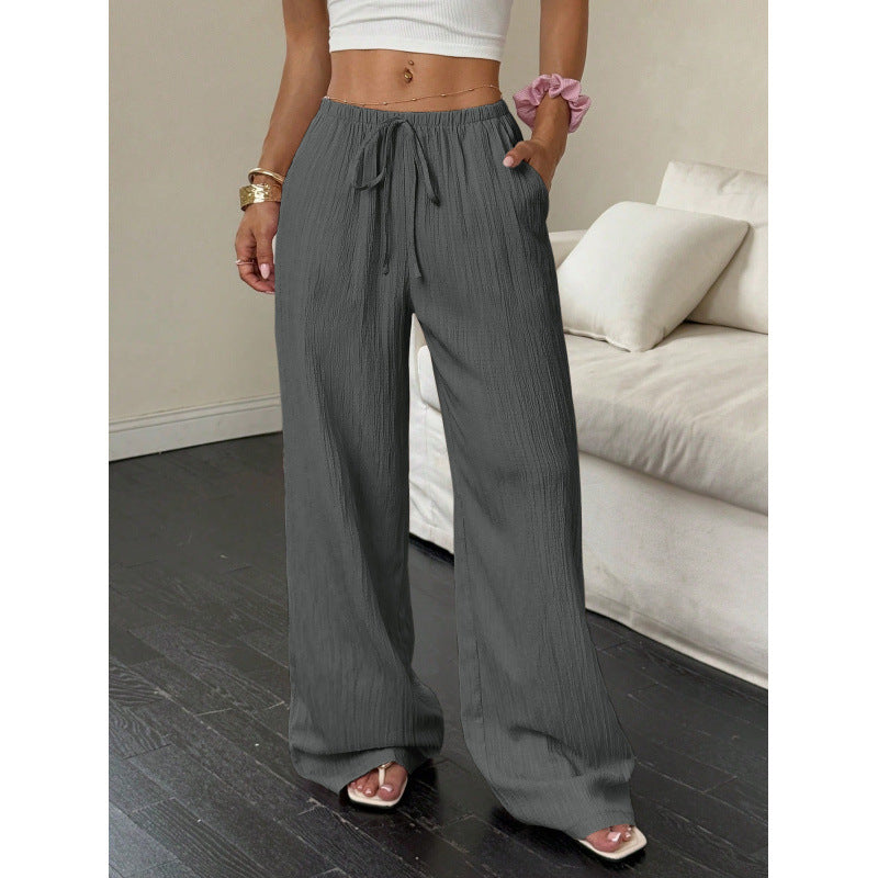 Women's casual and wide-legged leisure trousers with elasticated waistband and tie belt NOVAE