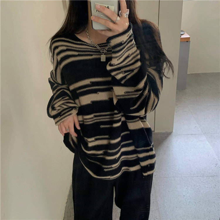 Women's knitted sweater with an elegant striped pattern and a relaxed fit NOVAE